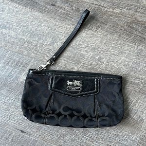 Coach wristlet - used- condition as shown.